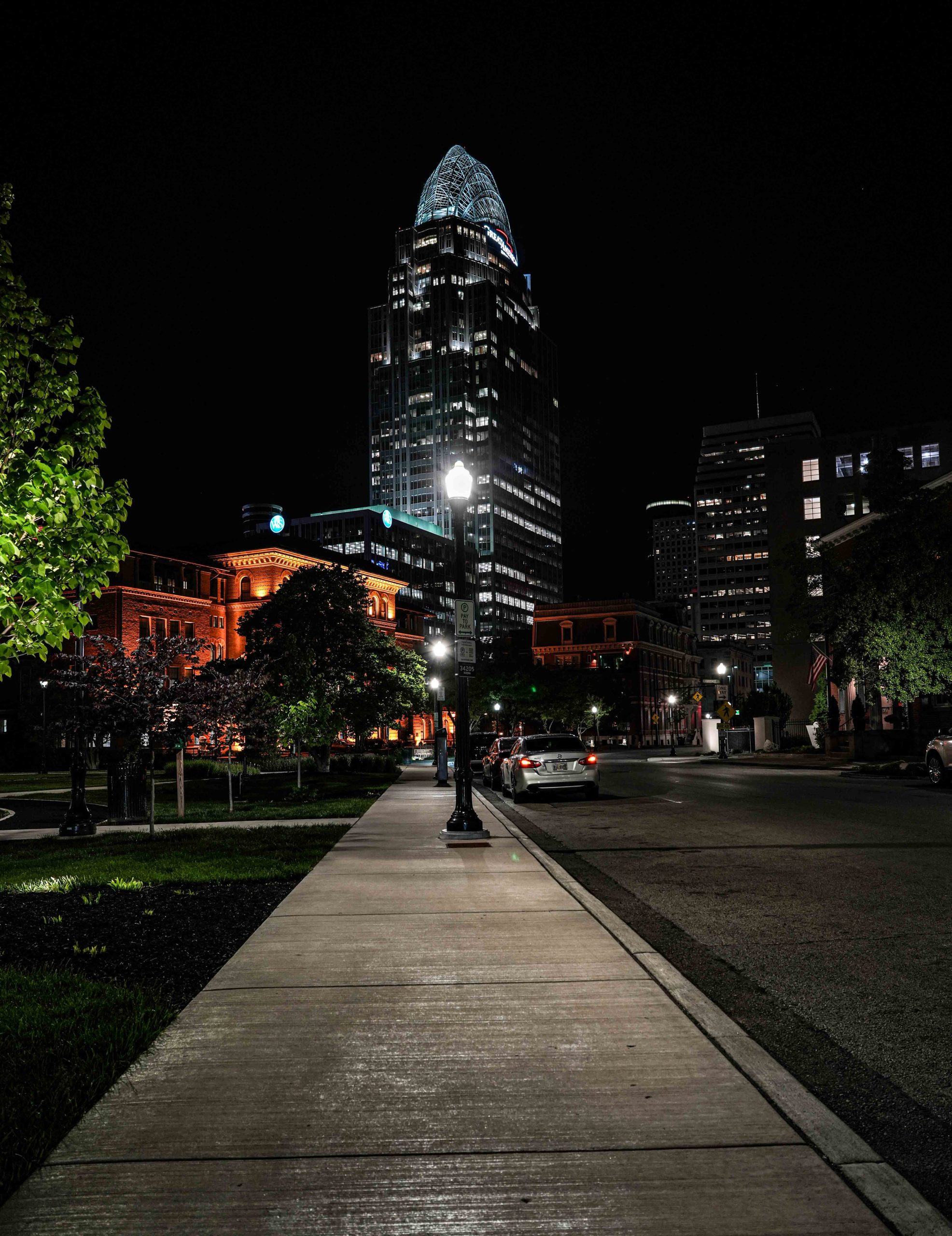 Kelly Richey street photography – downtown Cincinnati skyline at night near The Lytle