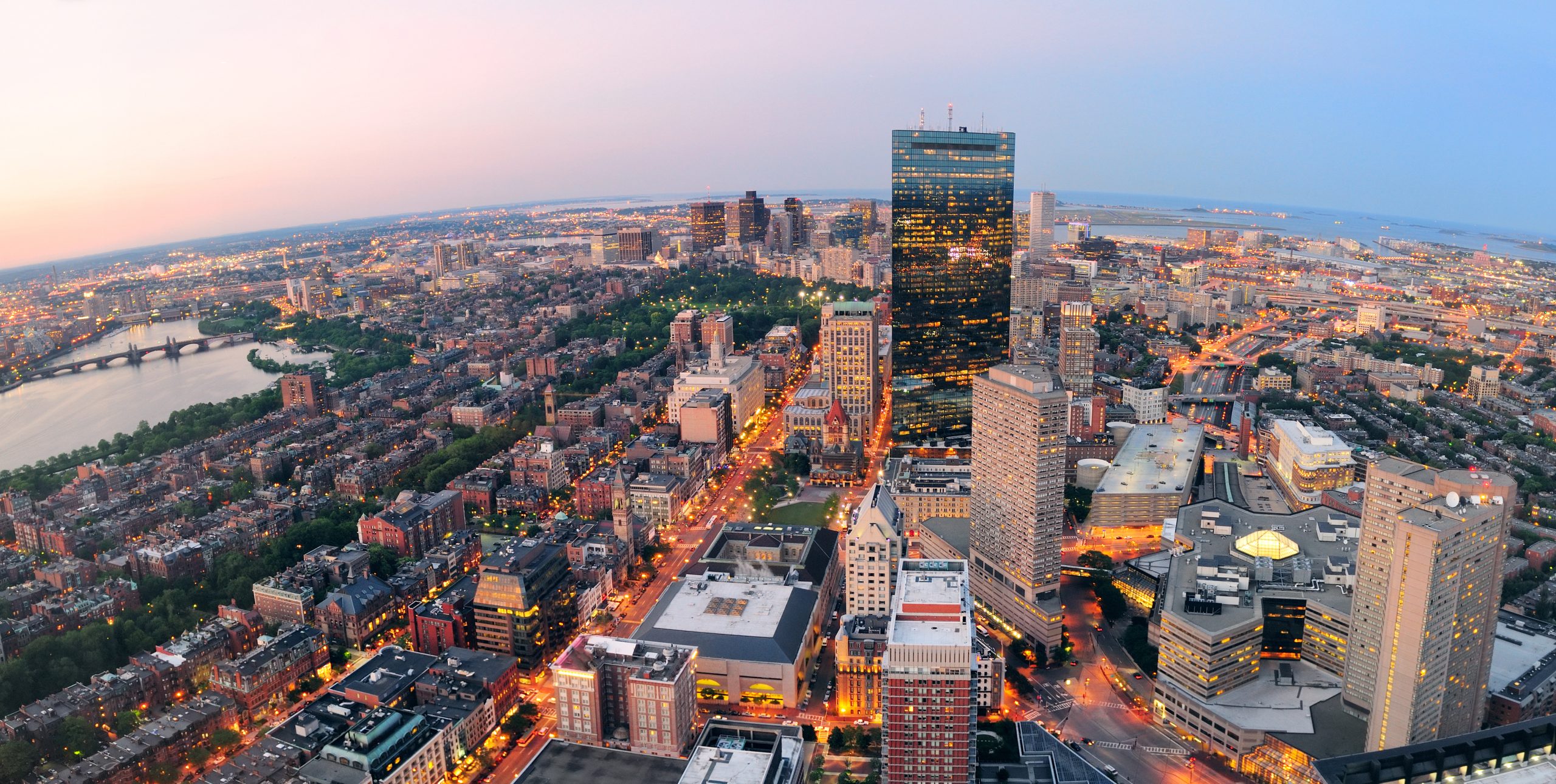 Panoramic aerial view of downtown Boston, Massachusetts, a destination highlighted by Kelly Richey for music, performance, and creative inspiration.